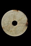 A JADE CARVED DISC BI