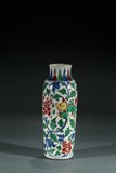 A CHINESE WUCAI 'BUDDHIST LION' VASE