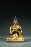 A TIBETAN GILT BRONZE FIGURE OF BUDDHA