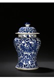 A BLUE AND WHITE DRAGON PORCELAIN JAR AND COVER
