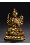 A GILT-BRONZE FIGURE OF TSONGKHAPA
