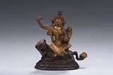 A COLD GILT FIGURE OF MANJUSRI
