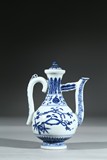 A BLUE AND WHITE 'FLOWERS' TEAPOT AND COVER