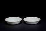 A PAIR OF CELADON GLAZED DISHES