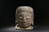A LARGE WOOD CARVED BUDDHA HEAD