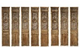 A SET OF EIGHT WOOD DOOR PANELS 