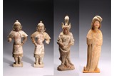 A SET OF FOUR PAINTED POTTERY FIGURES