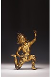 A TIBETAN GILT BRONZE FIGURE OF BUDDHIST GUARDIAN