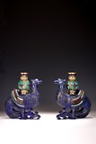 A PAIR OF LAPIS INLAID LAZULI PHOENIX WITH VASES