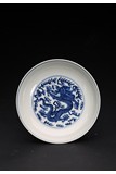 A CHINESE BLUE AND WHITE 'DRAGON' DISH