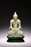 A CHINESE WHITE JADE AMITAYUS WITH GREEN JADE STAND
