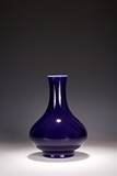 A CHINESE SACRIFICIAL BLUE GLAZED BOTTLE VASE