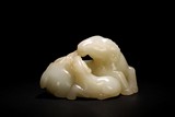 A CHINESE WHITE JADE CARVING OF RAMS
