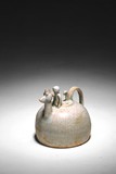 A CHINESE CELADON GLAZED WATER DROPPER