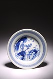 A BLUE AND WHITE 'PAVILLION AND MOUNTAIN' DISH
