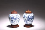 A PAIR OF BLUE AND WHITE 'PHOENIX' JARS