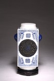 A BLUE AND WHITE CARVED SQUARE VASE