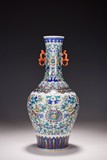 A CHINESE DOUCAI 'LOTUS SPRAYS' BOTTLE VASE