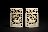 A PAIR OF WHITE JADE RETICULATED PLAQUES