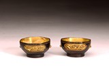 A PAIR OF CHINESE GILT BRONZE CAST 'FLOWERS' CUPS