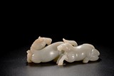 A LARGE CHINESE WHITE JADE CARVING OF HORSE GROUP