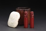 PAIR OF AMBER SEALS WITH HUANGHUALI BOX AND JADE COVER