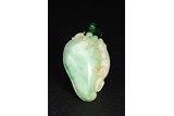 A JADEITE CARVED MYTHICAL BEAST PENDANT