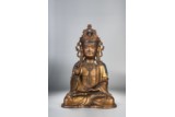 A LARGE GILT BRONZE SEATED FIGURE OF GUANYIN