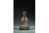 A CHINESE PARCEL-GILT BRONZE FIGURE OF SEATED GUANYIN