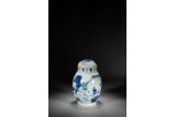 A CHINESE BLUE AND WHITE 'FIGURES' VASE WITH COVER