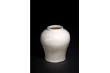 A CHINESE WHITE GLAZED JAR