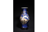 A CHINESE LARGE BLUE GLAZED CARVED 'FLOWERS' VASE 