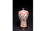 AN UNDERGLAZE RED 'BAMBOO AND PINES' VASE 