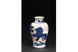A BLUE AND WHITE WUCAI 'BUDDHIST LION' VASE