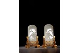 A PAIR OF WHITE JADE 'ORCHIDS' TABLE SCREENS