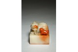 AN IMPERIAL CHINESE SOAPSTONE CARVED 'MYTHICAL BEASTS' SEAL 