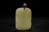 A CHINESE YELLOW JADE INSCRIBED PENDANT