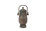 AN ARCHAIC BRONZE 'CORRUGATED PATTERN' HU VESSEL