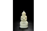 A CHINESE WHITE JADE CARVED FIGURE OF VAIROCANA