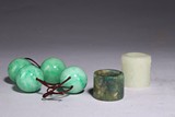 A SET OF HARDSTONE BEADS AND JADE ARCHER'S RINGS