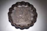 A CHINESE BLACK LACQUERED 'BIRD' INSCRIBED DISH