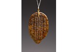 A JADE CARVED LEAF SHAPE INSCRIBED PENDANT