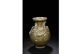 A YUE WARE CELADON 'DRAGON' VASE 