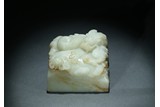 A WHITE JADE 'DRAGON' PAPER WEIGHT