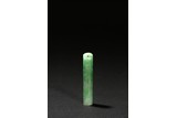 A JADEITE CARVED TUBE PENDANT