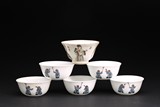 A GROUP OF SIX PORCELAIN CUPS
