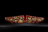 A PAIR OF GILT RED LACQUERED CARVINGS