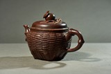 A YIXING 'BASKET' TEAPOT