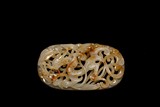 A RETICULATED CHINESE WHITE JADE CARVED 'DRAGON' PLAQUE