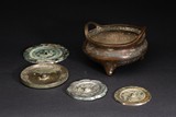 A GROUP OF FOUR BRONZE MIRRORS AND CENSER